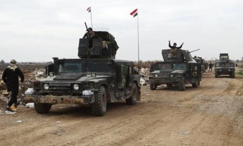 Các lực lượng an ninh Iraq tiến quân về trung tâm thành phố Ramadi tháng 12/2015. Ảnh: Reuters.