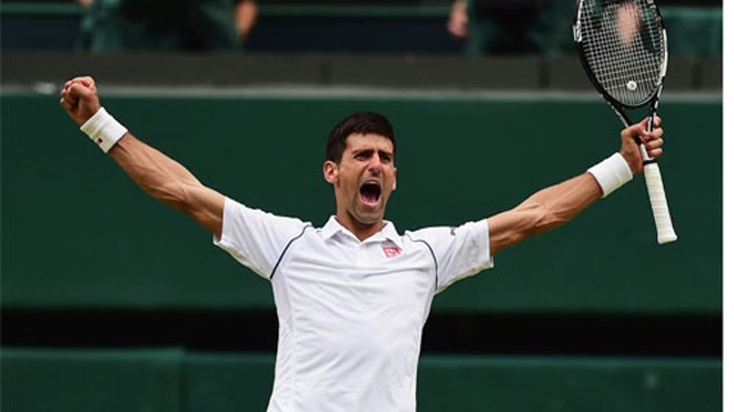 Novak Djokovic vui mừng sau khi giành chức vô địch Wimbledon 2015. Ảnh: Reuters.