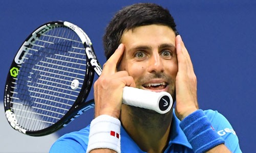 Djokovic tâm phục khẩu phục khi thua Wawrinka. Ảnh: Reuters.