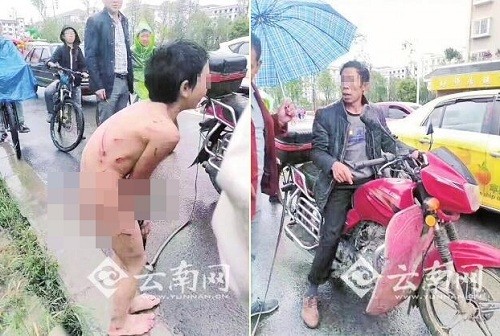 Cậu bé 12 tuổi khóc và run rẩy vì lạnh. Ảnh: Yunnan.cn.