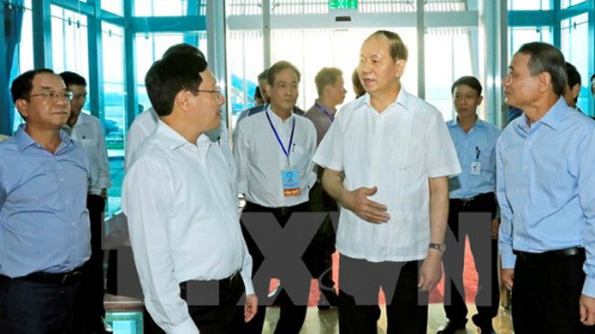 Chủ tịch nước Trần Đại Quang kiểm tra công tác an ninh tại sân bay quốc tế Đà Nẵng. Ảnh: TTXVN.