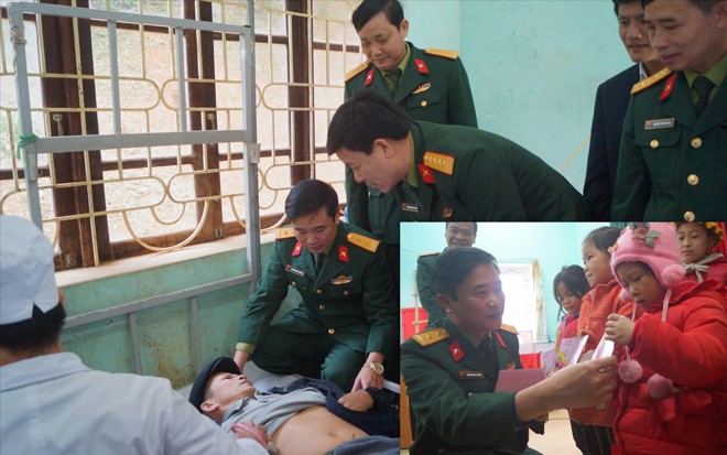 Lãnh đạo các đơn vị tặng quà trẻ em nghèo (ảnh nhỏ) và thăm hỏi người dân huyện Tràng Ðịnh, tỉnh Lạng Sơn tới khám chữa bệnh miễn phí, ngày 29/1 Ảnh: NGUYỄN MINH