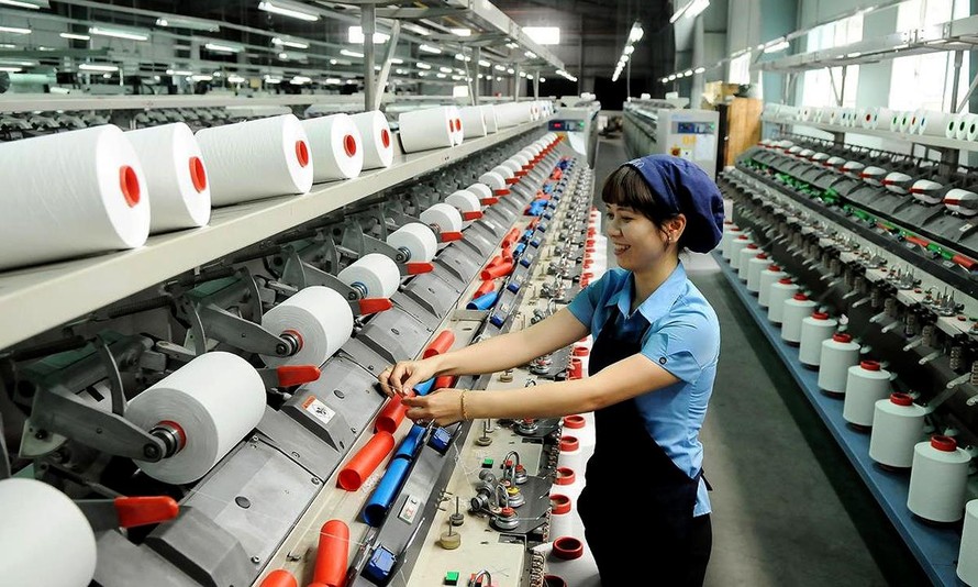 Dây chuyền sản xuất dệt may Tâm Thịnh Phát, thành phố Hồ Chí Minh. Ảnh: Hồng Vĩnh