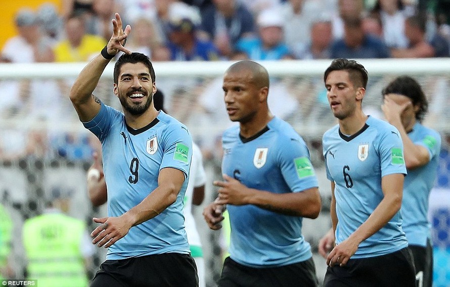 Uruguay chính thức giành vé dự vòng 1/8. Ảnh: Getty.