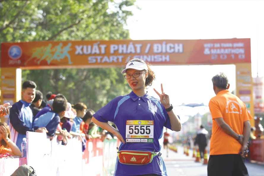Nữ nhà báo Khương Xuân về đích “xinh tươi” cự ly 5 km tại giải Tiền Phong Marathon năm 2018 tại Buôn Ma Thuột ảnh: Như Ý