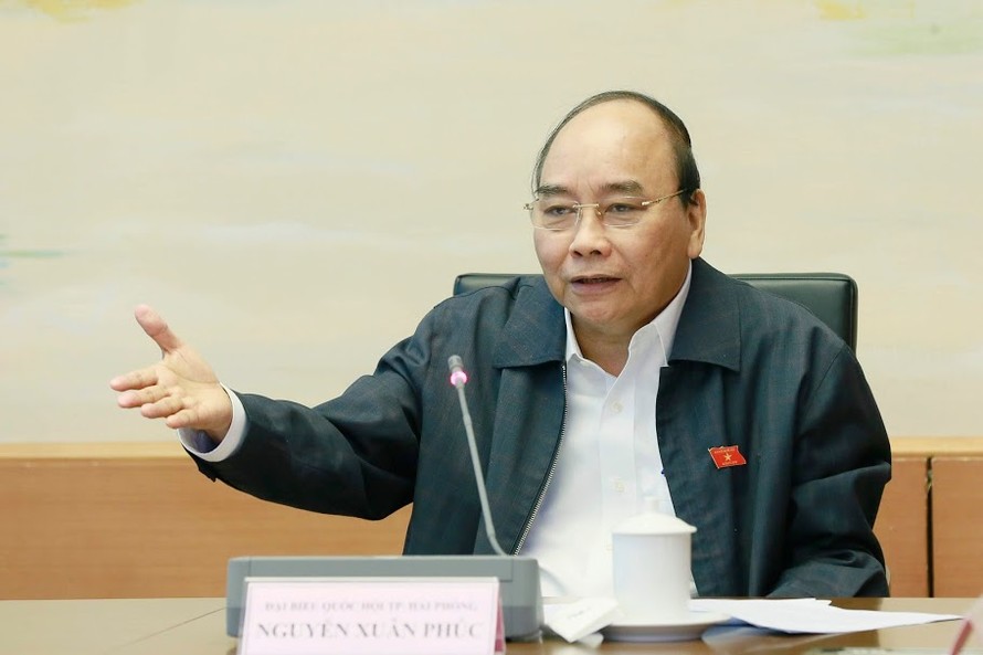 Thủ tướng Nguyễn Xuân Phúc phát biểu tại phiên họp tổ ngày 11/11. Ảnh Như Ý