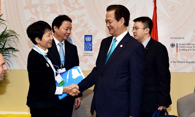 Thủ tướng Nguyễn Tấn Dũng tiếp bà Naoko Ishii, Tổng giám đốc điều hành kiêm Chủ tịch Quỹ Môi trường toàn cầu. Ảnh: Chinhphu