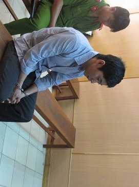 Đặng Thanh Phong tại tòa ngày 22/3. Ảnh: Tân Châu