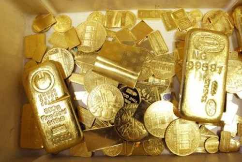 Giá vàng đang tiến rất gần mốc 1.200 USD. Ảnh: AFP.