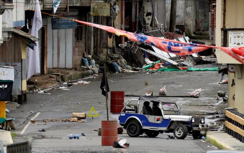 Một khu nhà bị nhóm khủng bố Maute chiếm đóng tại Marawi. Ảnh: Reuters