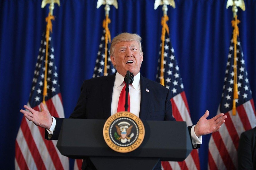 Tổng thống Donald Trump phát biểu trước báo giới về vụ bạo động ở Charlottesville tại Trump National Golf Club (bang New Jersey, Mỹ). Ảnh: Getty Images