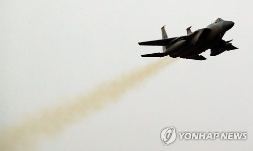 Chiến đấu cơ F-15K của Hàn Quốc xuất kích sáng 4/12, trong khuôn khổ cuộc tập trận "Vigilant ACE". Ảnh: Yonhap