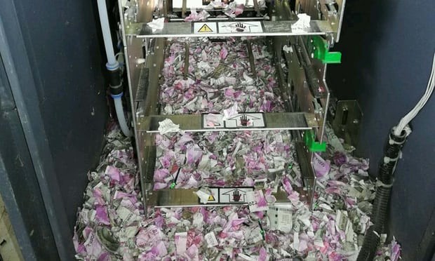 Tiền trong máy ATM bị chuột cắn nát. Ảnh: AFP
