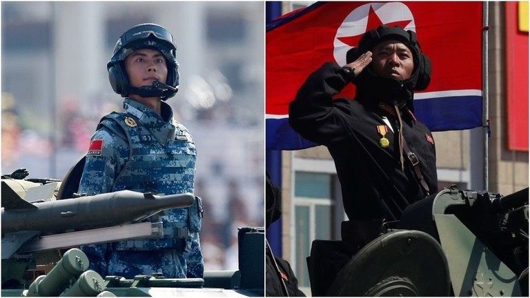 Binh sĩ Trung Quốc (trái) và binh sĩ Triều Tiên (phải). Ảnh: Reuters