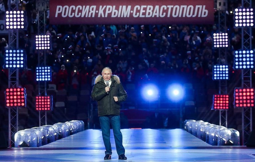Tổng thống Nga Putin trong sự kiện ngày 18/3. Ảnh: Tass