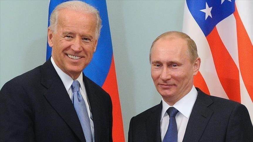 Hai ông Biden - Putin trong cuộc gặp năm 2011. Ảnh: AA