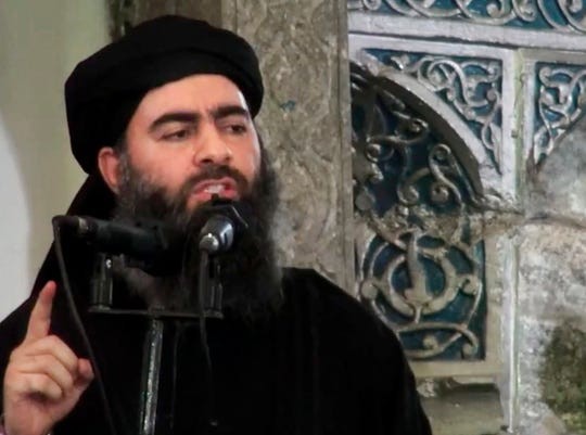 Hình ảnh thủ lĩnh IS Abu Bakr al-Baghdadi trong video đăng trên website của IS hôm 5/7/2014. Nguồn: AP.