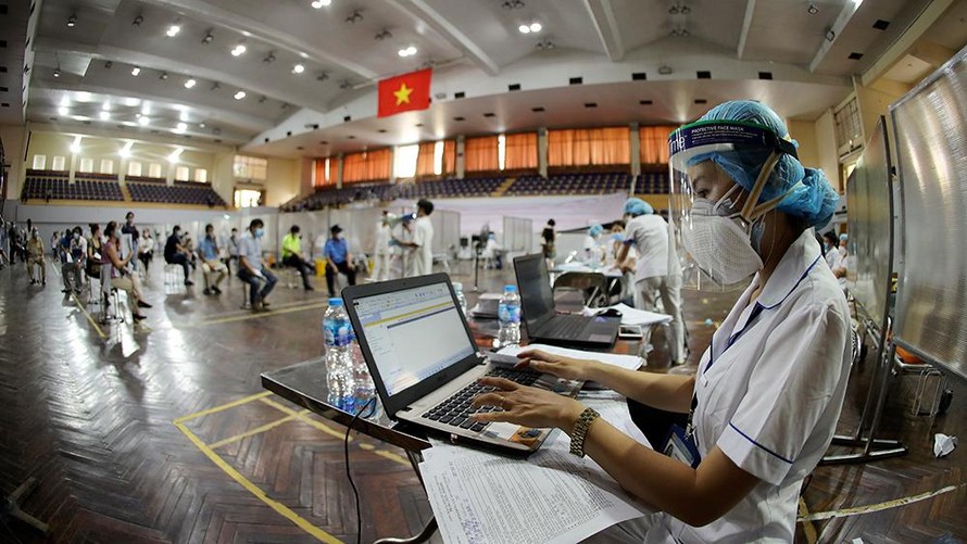 Một điểm xét nghiệm COVID-19 ở Hà Nội. Ảnh: Mạnh Thắng