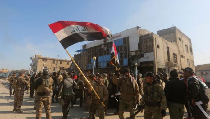 Quân đội Iraq ăn mừng chiến thắng. Ảnh: AFP