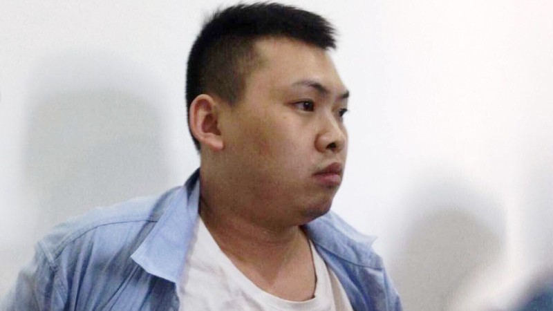 Nghi phạm Xiao Qui Ping tại cơ quan Công an TP Đà Nẵng. 