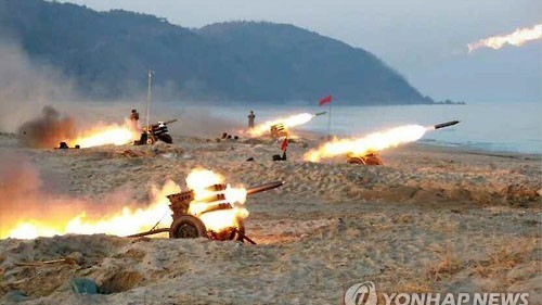 Hình ảnh về cuộc tập trận được đăng tải trên tờ Rodong Shimun của Triều Tiên số ra ngày 21/12.