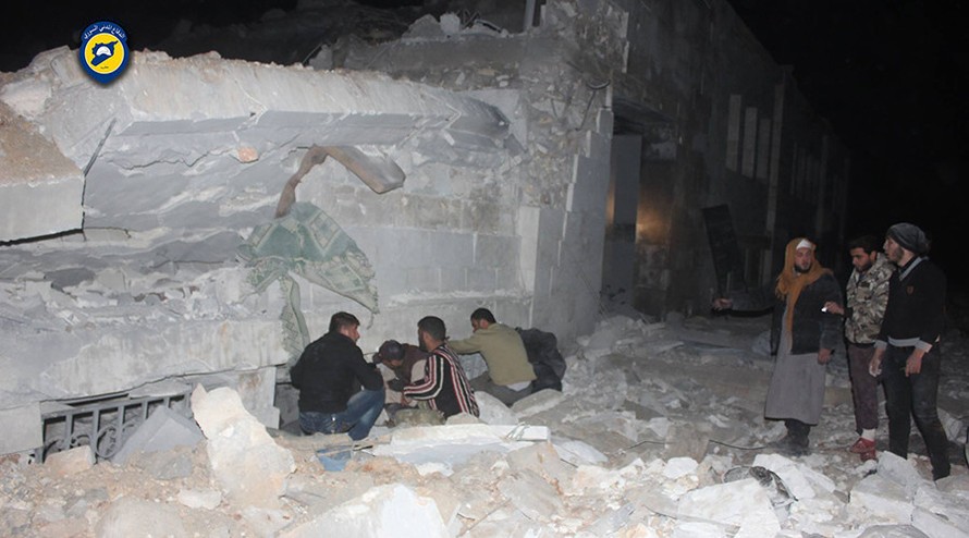 Hiện trường vụ không kích nhà thờ hôm 16/3 ở al-Jina, tây bắc Syria.