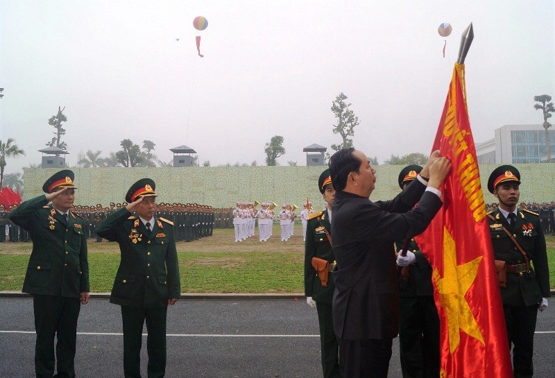 Chủ tịch nước Trần Đại Quang trao tặng Huân chương Quân công hạng Nhất cho Binh chủng Đặc công, ngày 19/3/2017. Ảnh: Nguyễn Minh