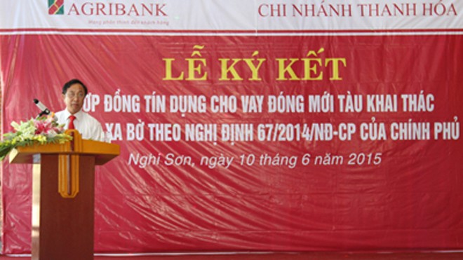 Ông Trịnh Ngọc Thanh - GĐ Agribank chi nhánh Thanh Hóa báo cáo kết quả triển khai cho vay theo Nghị định 67 tại địa bà