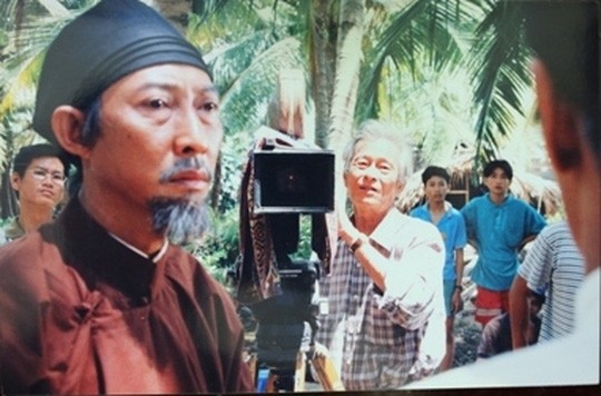 NSND - Đạo diễn Nguyễn Huy Thành (người cầm máy quay) Ảnh: St