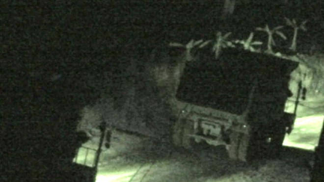  Xe tải của K. “Chân to” chở than trộm cắp, ảnh chụp từ video clip của các nhà báo.