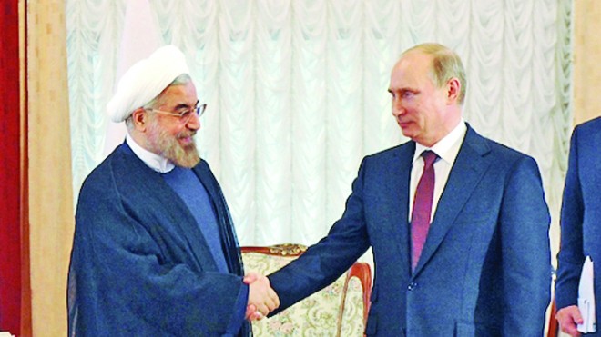 Tổng thống Nga Putin (phải) và Tổng thống Iran Rouhani