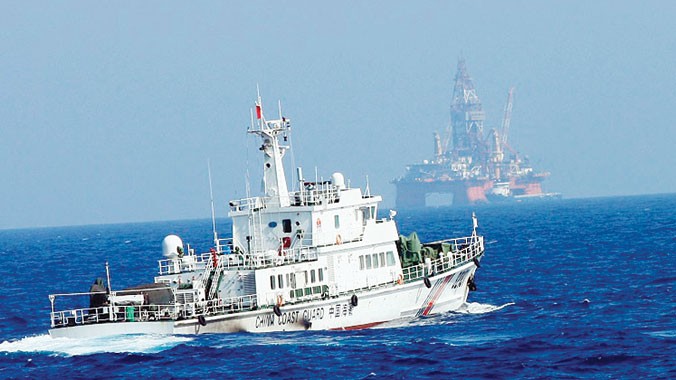 Trung Quốc tăng cường đội tàu và giàn khoan phục vụ tham vọng lãnh thổ. Ảnh: Xinhua