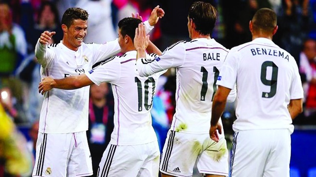 Ronaldo (trái) là đầu tàu trên hàng công khủng của Real. Ảnh: Getty Images