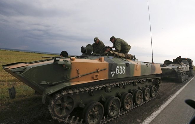 Xe quân sự Nga được ghi nhận tại vùng Rostov, gần biên giới Ukraine hôm 24/8. Nguồn: AFP