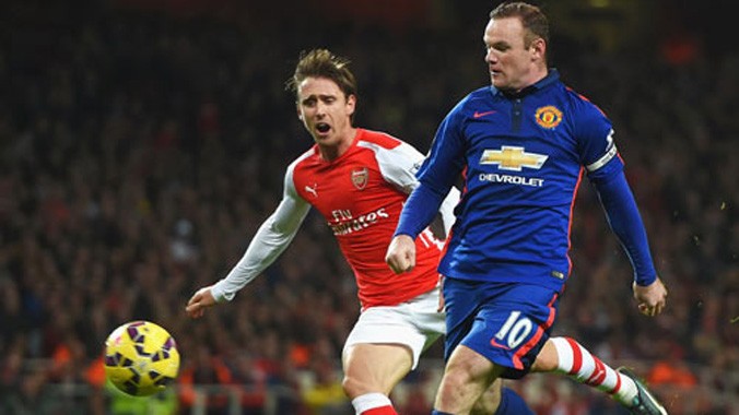 Wayne Rooney trong pha ghi bàn giúp Man.United thắng 2-1 tại Arsenal ở lượt đi Premier League.