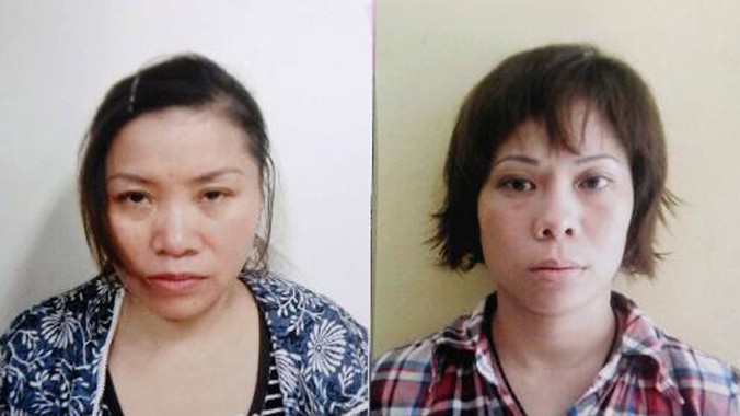 Đối tượng Phạm Thị Nguyệt (trái) và Nguyễn Thị Thanh Trang tại cơ quan công an. Ảnh: Cơ quan công an cung cấp.