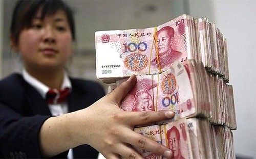 Đợt phá đồng tiền quy mô lớn đầu tiên của Trung Quốc kể từ năm 1994 đã khiến thị trường tài chính toàn cầu bị sốc. Ảnh: Bloomberg.