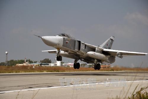Máy bay chiến đấu Su-24 của Nga tại căn cứ quân sự Hmeymim, tỉnh Latakia, Syria ngày 21/10. Ảnh: THX/TTXVN.