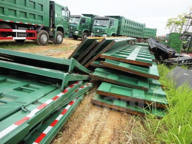 Hàng loạt xe tải cỡ lớn nhập khẩu với kết cấu thành thùng xe vượt quá cấp phép. Ảnh: Cục Đăng kiểm Việt Nam cung cấp.