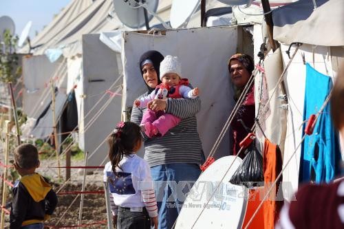 Người tị nạn Syria tại một trại tị nạn ở Osmaniye, Thổ Nhĩ Kỳ. Ảnh: AFP/TTXVN.