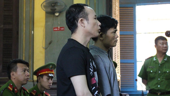 Hai bị cáo tại phiên tòa phúc thẩm ngày 7/1. Ảnh: Tân Châu.