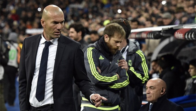 Zidane (trái) khởi đầu hoàn hảo trong sự nghiệp HLV đỉnh cao. Ảnh: Reuters.