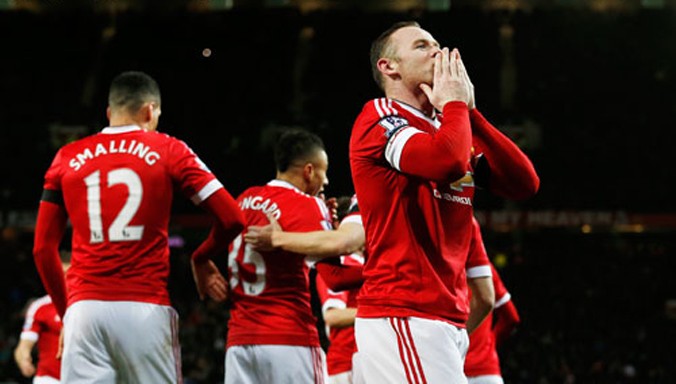 Rooney ăn mừng bàn thắng thứ ba cho Man Utd. Ảnh: Reuters.