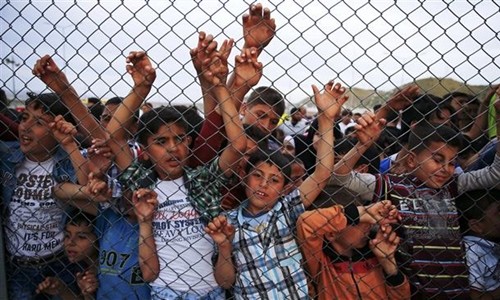 Trẻ em Syria tại trại tị nạn Nizip, Gaziantep, Thổ Nhĩ Kỳ, ngày 23/4. Ảnh: Reuters.