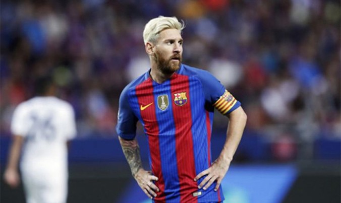 Messi và vẻ ngoài mới ở Barca. Ảnh: Reuters.