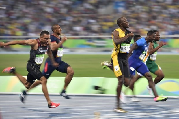 Cú nước rút thần tốc của 'Tia chớp đen' tại 3 kỳ Olympic
