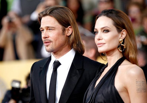 Angelina Jolie muốn nuôi cả 6 con nhưng Brad Pitt không đồng ý. Ảnh: AP.