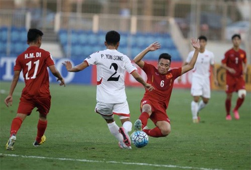 Xác định tinh thần thi đấu phù hợp và cố gắng hết mình, theo HLV Hoàng Anh Tuấn, là chìa khoá chiến thắng của U19 Việt Nam. Ảnh: AFC.