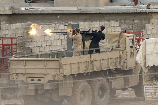 Quân đội Iraq đang tấn công nhóm khủng bố IS ở Mosul, Iraq. Ảnh: Reuters.