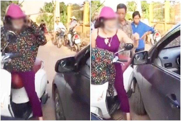 Người phụ nữ cởi áo, chửi lái xe ô tô như “tát nước” rồi xông vào đánh nhau 
